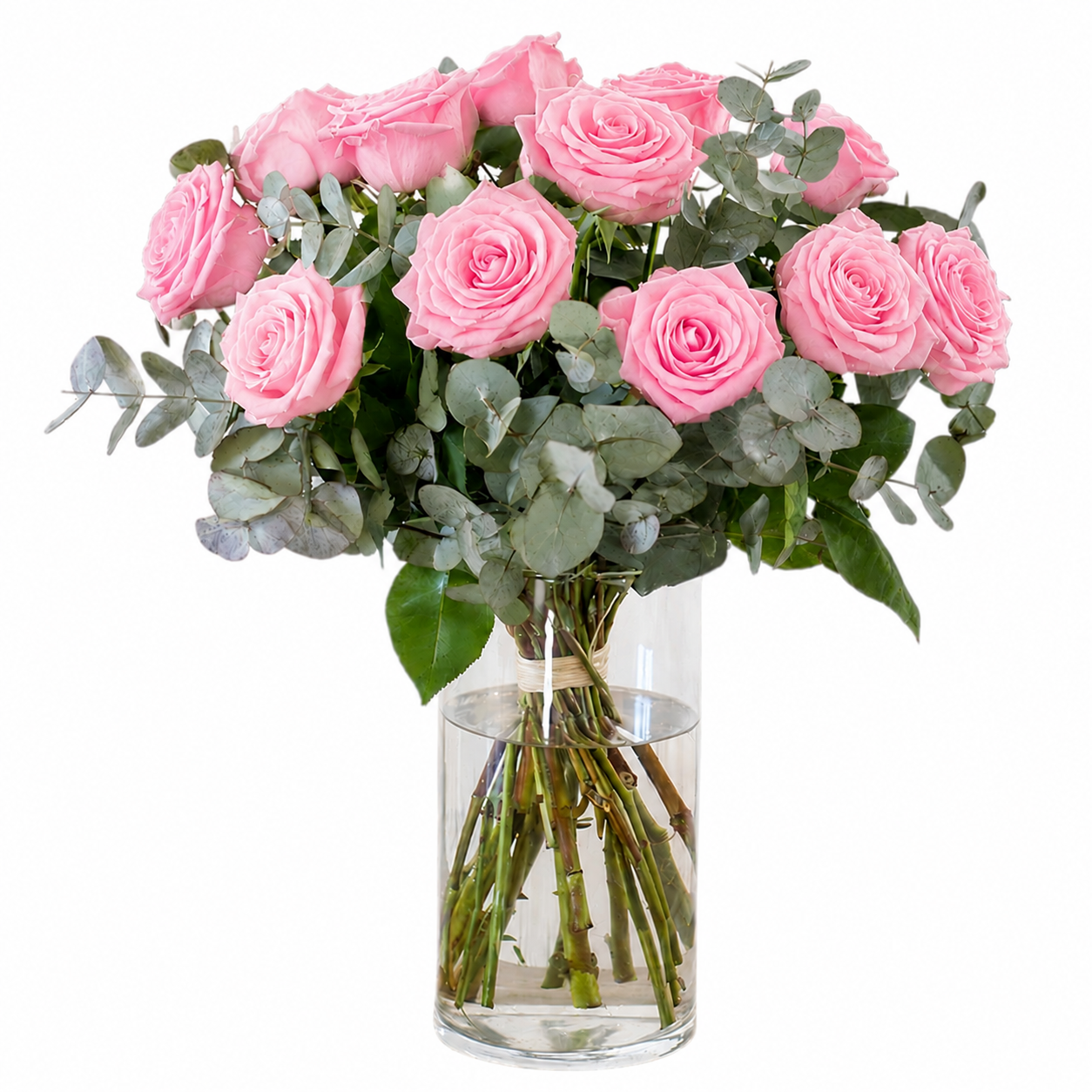 Ramo de rosas rosas con eucalipto en jarrón - Floristería Peregrina Pontevedra