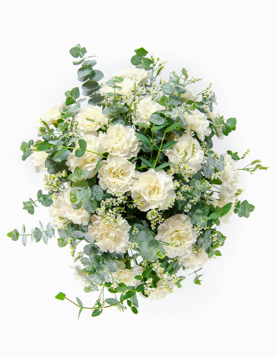 Vista superior ramo de claveles blancos y eucalipto - Floristería Peregrina